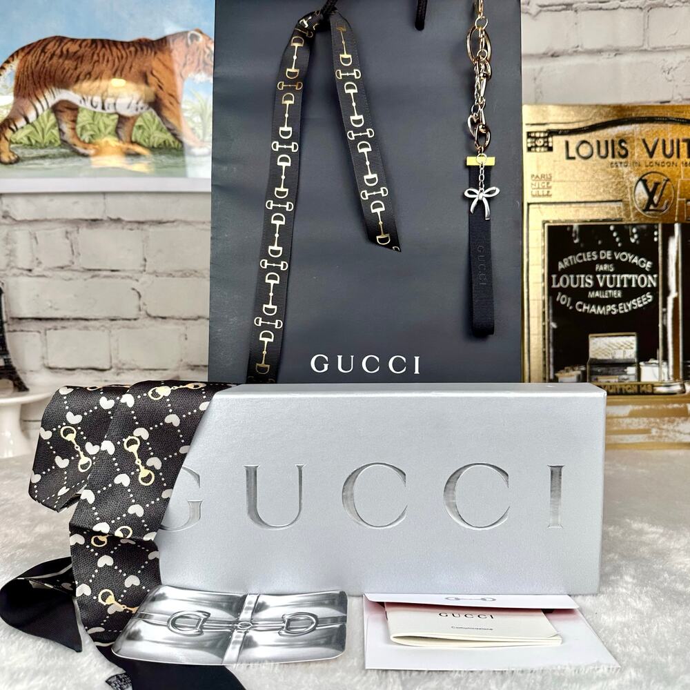 Gucci box and gift bag set. New! Great for gifts.